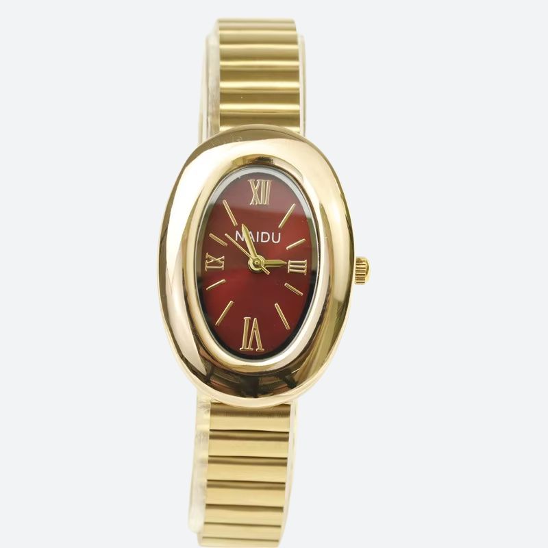 Złoty zegarek damski owalny z czerwoną tarczą i rzymskimi cyframi