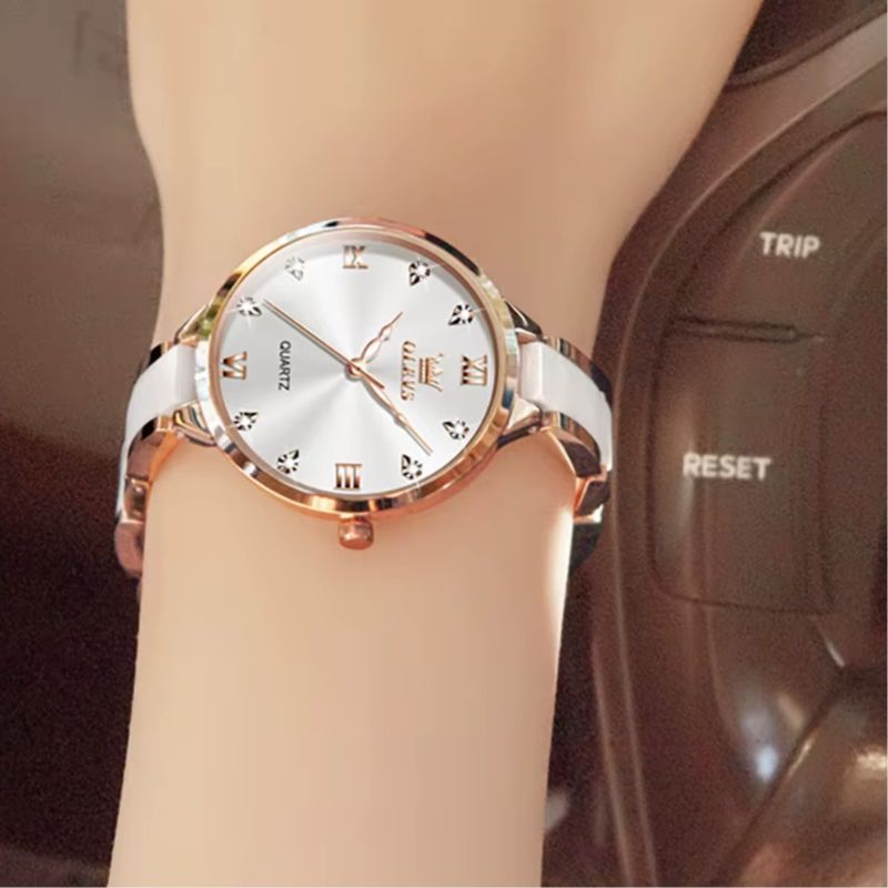 Zegarek ceramiczny damski w różowym złocie z białą tarczą i rzymskimi cyframi