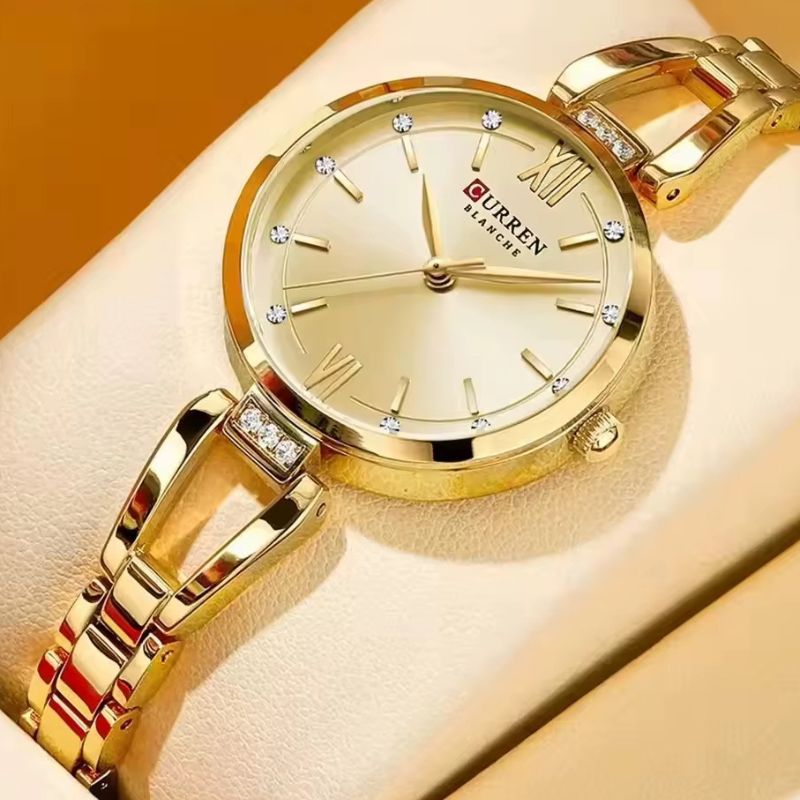 Zegarek damski quartz Curren Blanche w złocie z tarczą kremową i diamentami