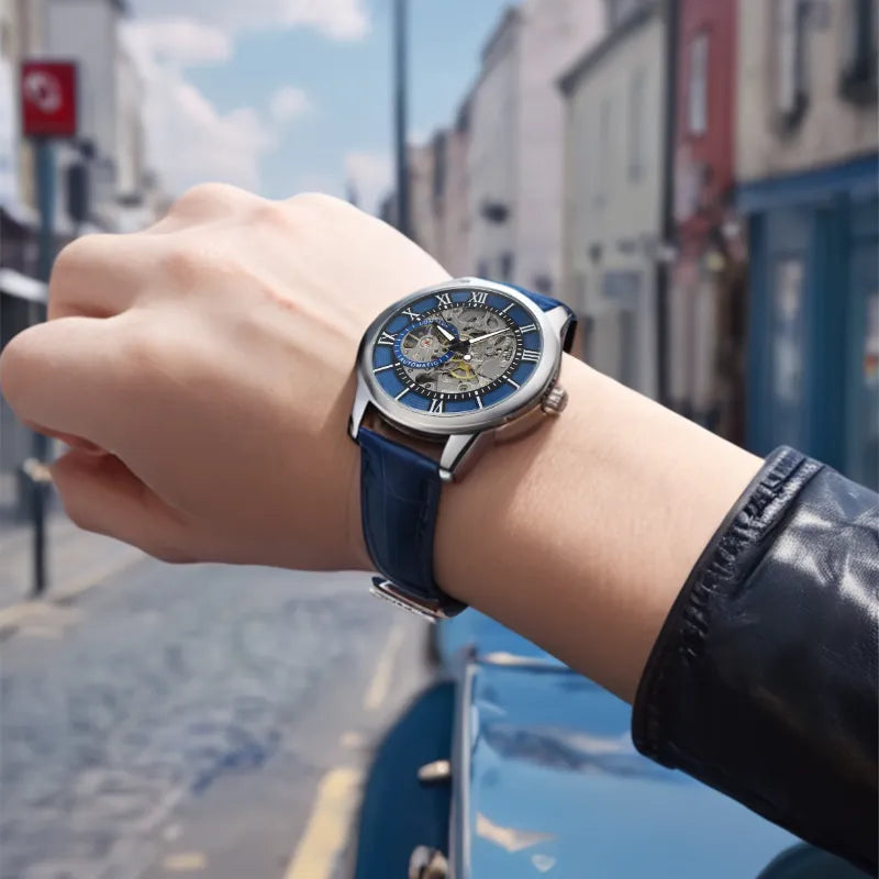 Srebrny szkieletowy zegarek mechaniczny z niebieską tarczą i rzymskimi cyframi