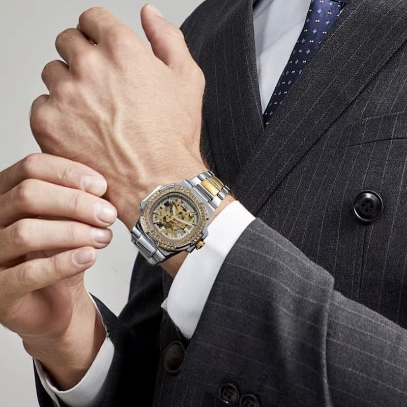 Luksusowy zegarek mechaniczny szkieletowy dwutonowy ze stali i złota z diamentową lunetą