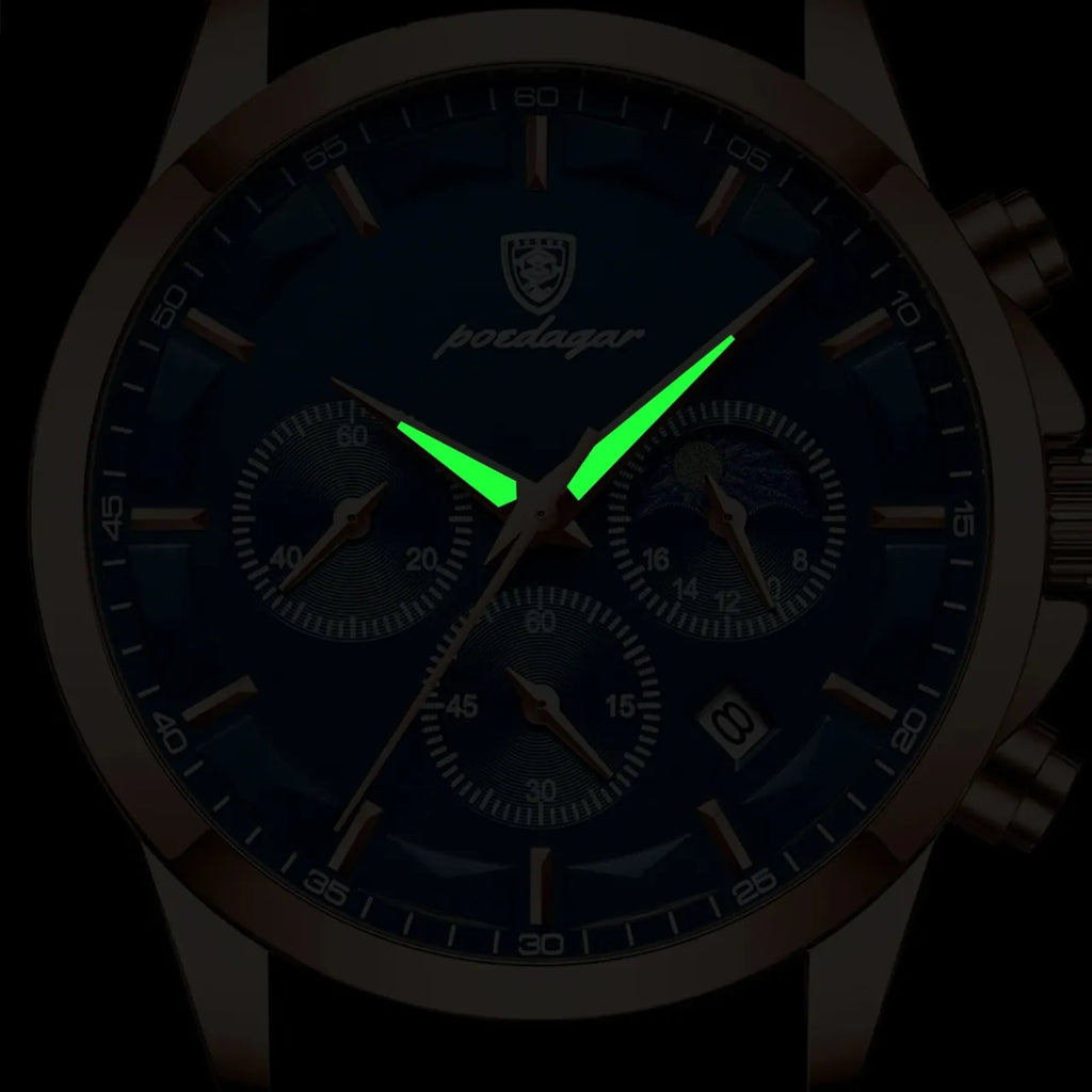 Ciemnoniebieski chronograf męski z brązowym paskiem, zielonymi luminescencyjnymi wskazówkami i różowozłotą kopertą