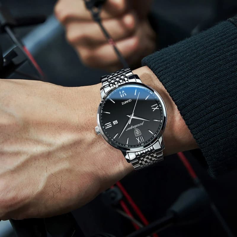 Srebrny minimalistyczny zegarek męski Zurvo z czarną tarczą i bransoletą mesh